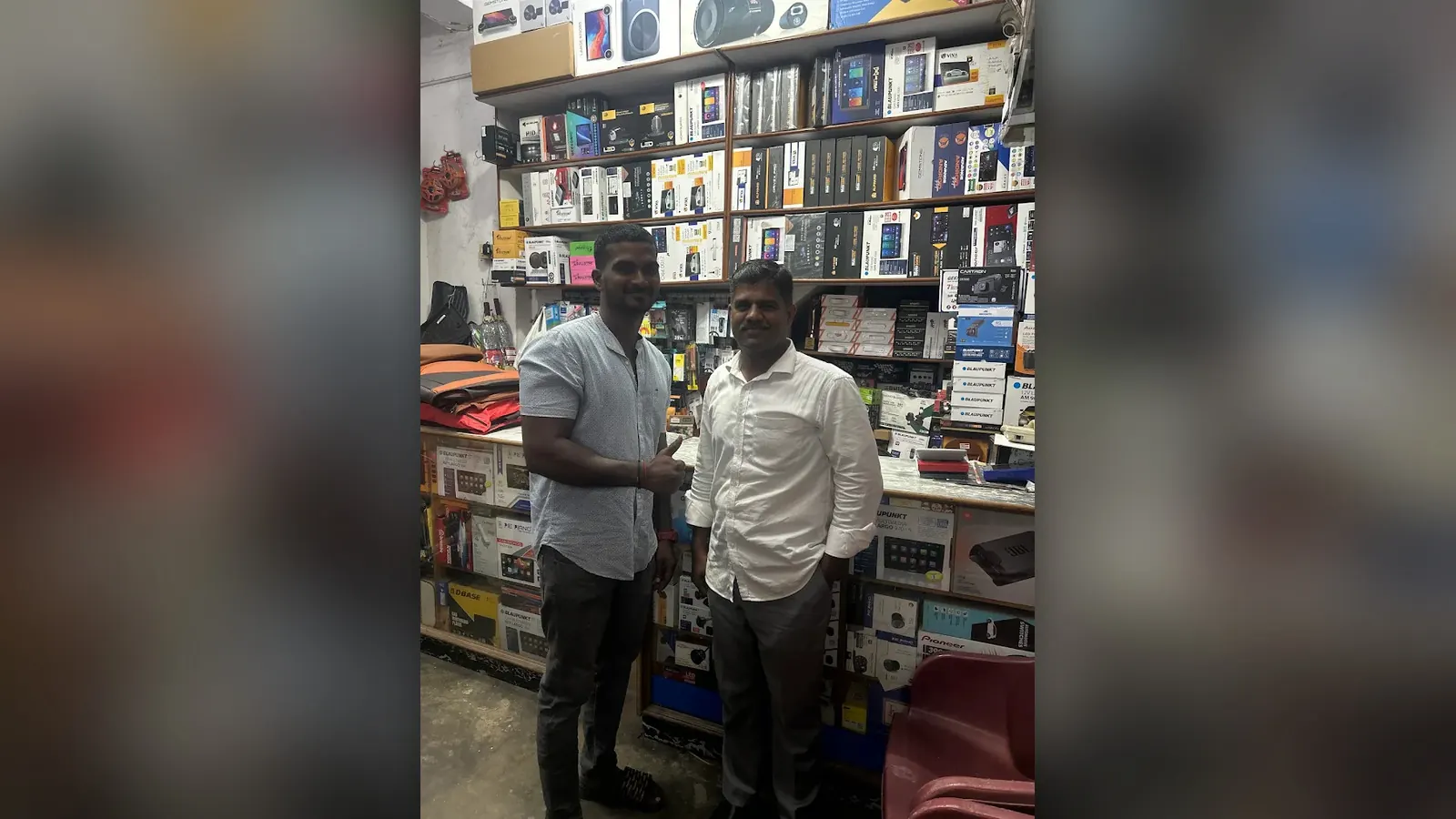 Two visitors inside MRV shop